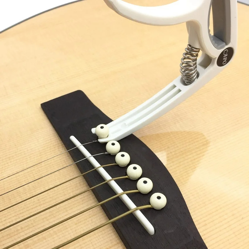 Plastic Guitar Capo for 6 Stri - огляд і ціна Guitar Tuner Clip