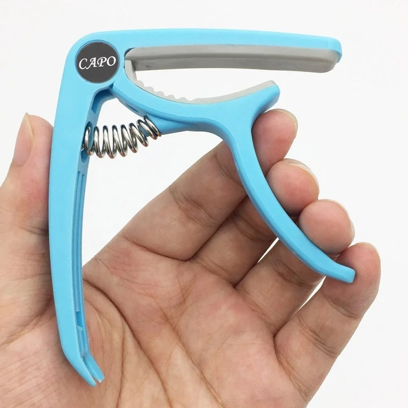 Plastic Guitar Capo for 6 Stri - огляд і ціна Guitar Tuner Clip